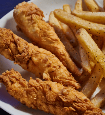 3 count chicken tender zingers on a plate with fries for kids