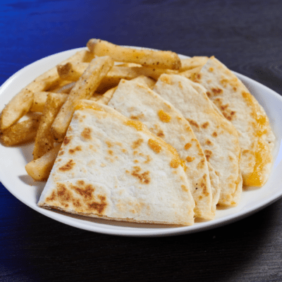 a plate of cheese quesadilla for kids with friends